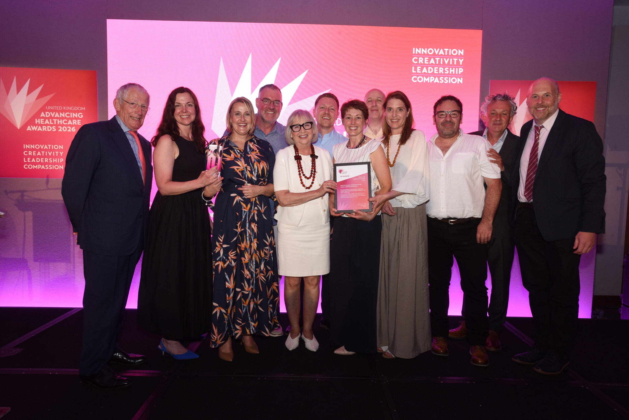 The NROL team receiving the Advancing Healthcare Awards (AHA) 2026 for the best collaboration across clinical, academia and industry.